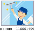 A male housekeeping staff member cleaning windows 116661459