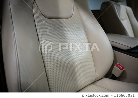 Before and after effect of cleaning leather upholstery in a car Before and after effect of cleaning leather upholstery in a car 116663051