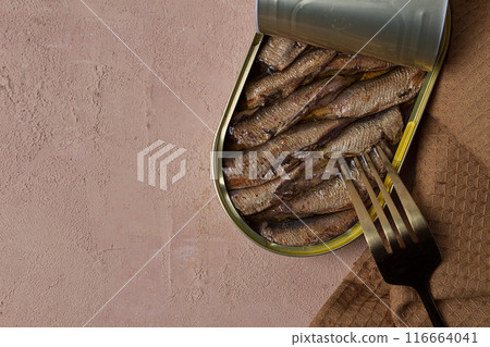 Sprats in oil, canned smoked fish, open, close-up, top view, no people, Sprats in oil, canned smoked fish, open, close-up, top view, no people, 116664041