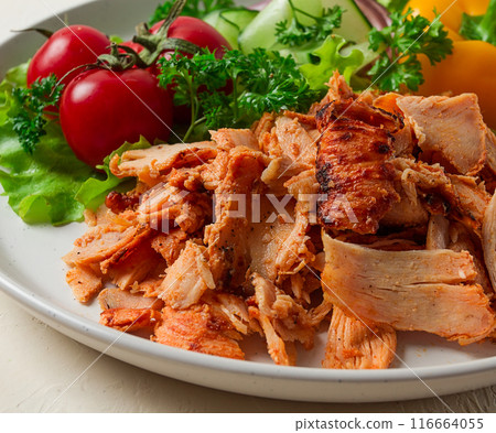 Gyros, chicken, with vegetables on plates, disassembled shawarma, fast food, appetizer, cooking 116664055