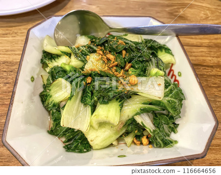 Stir-fried baby bok choy or chinese cabbage with oyster sauce 116664656