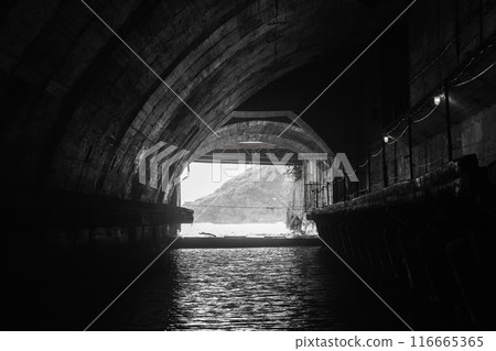 Exit gateway of an undeground concrete tunnel interior Exit gateway of an undeground concrete tunnel interior 116665365