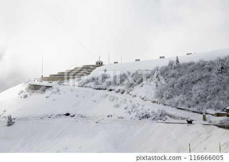 Mountain winter landscape. Mount Grappa war memorial building view 116666005