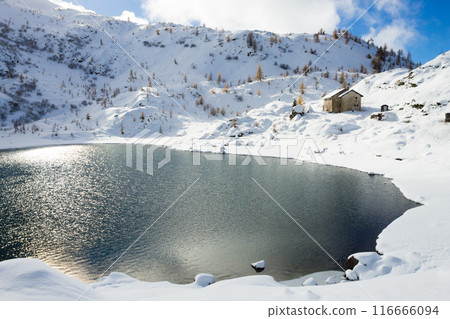 Beautiful small alpine lake in winter season landscape Beautiful small alpine lake in winter season landscape 116666094
