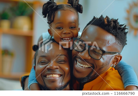 Happy Family Portrait With Young Daughter Smiling In Home Setting 116666790