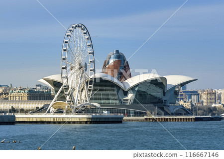 Shopping mall and white Ferris wheel in Baku, Azerbaijan Shopping mall and white Ferris wheel in Baku, Azerbaijan 116667146