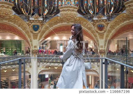 Girl on the observation balcony at the Galeries Lafayette in Paris Girl on the observation balcony at the Galeries Lafayette in Paris 116667196