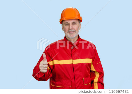 Portrait of happy elder man is showing like gesture. Isolated on blue. Portrait of happy elder man is showing like gesture. Isolated on blue. 116667481