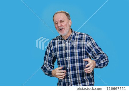 Aged mature businessman is laughing hard out loud. Isolated on blue. Aged mature businessman is laughing hard out loud. Isolated on blue. 116667531