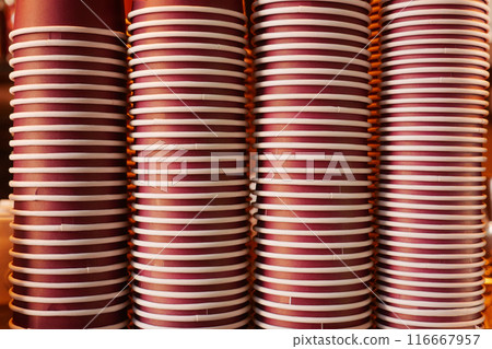 Lots of paper coffee cups at cafe  116667957