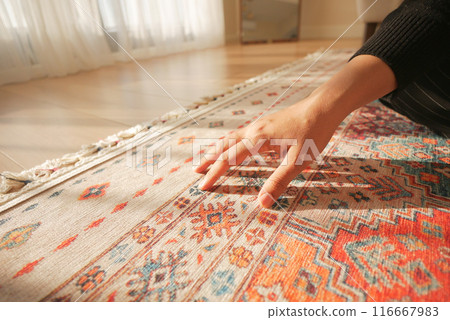 hand touching new home carpet  116667983