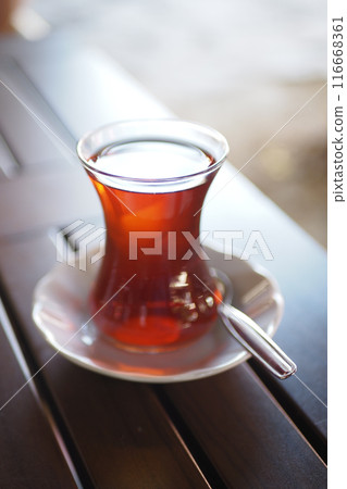 Traditional turkish tea on white table . Traditional turkish tea on white table . 116668361