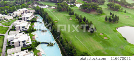 Aerial view of golf course and luxury villas in Belek, Turkey. Scenic panoramic view of golf fairway 116670031
