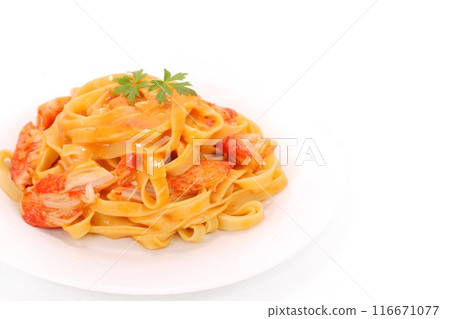 Crab-flavored tomato cream pasta with crab sticks on a light background Crab-flavored tomato cream pasta with crab sticks on a light background 116671077