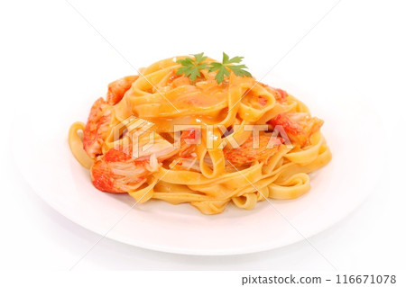 Crab-flavored tomato cream pasta with crab sticks on a light background 116671078