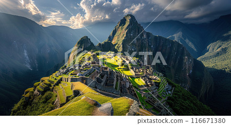 Historic Sanctuary of Machu Picchu on a mountain ridge, Eastern Cordillera of southern Peru. Incan citadel in the Andes Mountains, ancient civilization, sunset panorama landscape background Historic Sanctuary of Machu Picchu on a mountain ridge, Eastern Cordillera of southern Peru. Incan citadel in the Andes Mountains, ancient civilization, sunset panorama landscape background 116671380