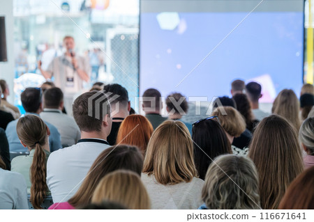 Audience listening to speaker during a business conference 116671641