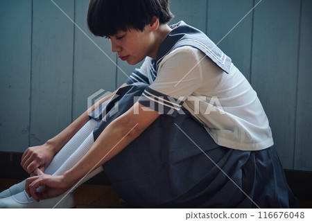 Depressed schoolgirl 116676048