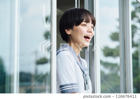 High school girls cheering from the window 116676411