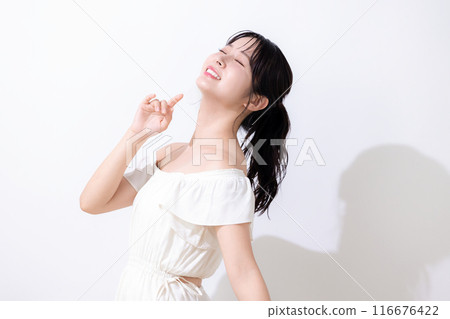 Beauty Summer image Woman wearing a white dress Beauty Summer image Woman wearing a white dress 116676422