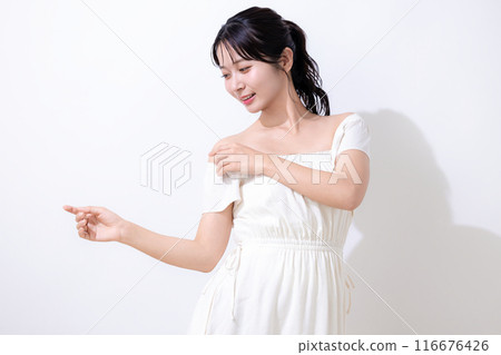 Beauty Summer image Woman wearing a white dress 116676426
