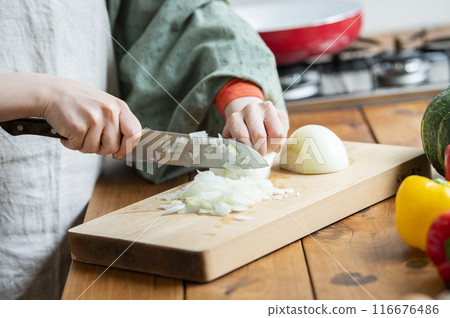 Woman cooking in the kitchen 116676486