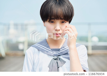 High school girl on the roof 116676934
