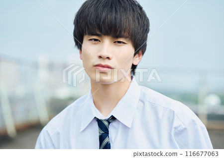 High school boy on the roof 116677063