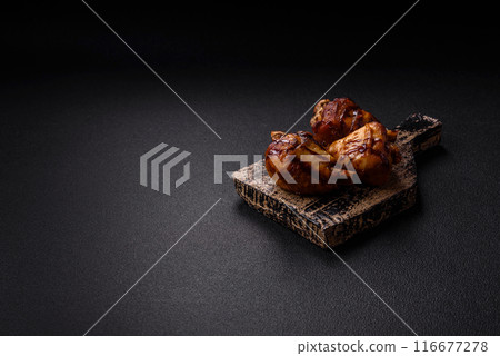 Delicious grilled chicken legs with spices and herbs Delicious grilled chicken legs with spices and herbs 116677278