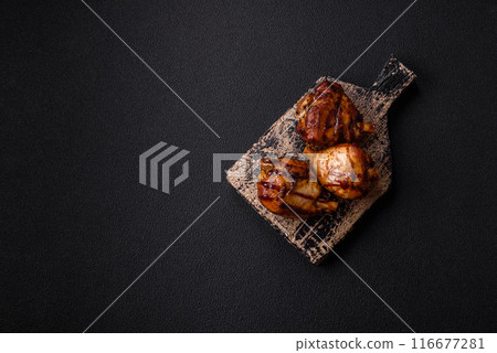 Delicious grilled chicken legs with spices and herbs Delicious grilled chicken legs with spices and herbs 116677281