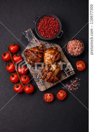 Delicious grilled chicken legs with spices and herbs Delicious grilled chicken legs with spices and herbs 116677300