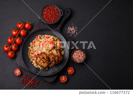 Delicious grilled chicken legs with spices and herbs Delicious grilled chicken legs with spices and herbs 116677372