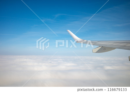 Sky seen from inside the airplane Sky seen from inside the airplane 116679133