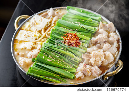 Fukuoka's specialty motsunabe (offal hotpot) topped with plenty of chives Fukuoka's specialty motsunabe (offal hotpot) topped with plenty of chives 116679774