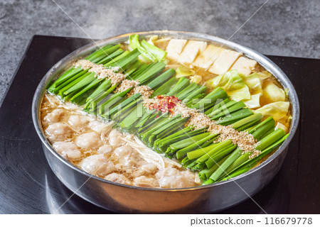 Fukuoka's specialty motsunabe (offal hotpot) topped with plenty of chives Fukuoka's specialty motsunabe (offal hotpot) topped with plenty of chives 116679778