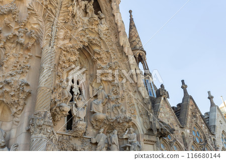 La Sagrada Familia Catalan Cathedral. Vertical view on the biggest cathedral in the world made by famous architecture Antonio Gaudi. Details 116680144