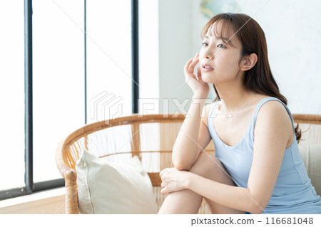Beauty image of a young woman doing skin care Beauty image of a young woman doing skin care 116681048