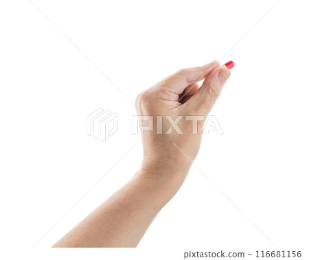 Mid aged female hold red and white pills isolated on white 116681156