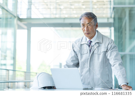 Senior man wearing work clothes Senior man wearing work clothes 116681335