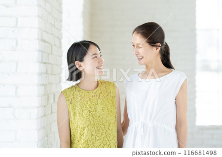 Portrait of a senior woman and her daughter 116681498