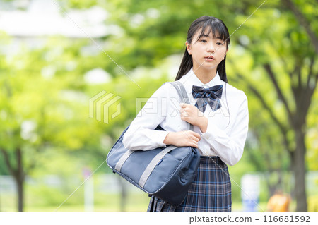 School girls with school bags School girls with school bags 116681592