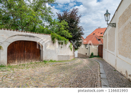 Narrow cobblestone streets and old houses in the Novy Svet quarter of the Hradcany historical district in Prague, Czech Republic Narrow cobblestone streets and old houses in the Novy Svet quarter of the Hradcany historical district in Prague, Czech Republic 116681993