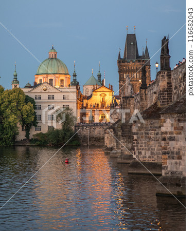 Evening view of the iconic Charles Bridge over Vltava river and Prague Old town cityscape, in Prague, Czech Republic 116682043