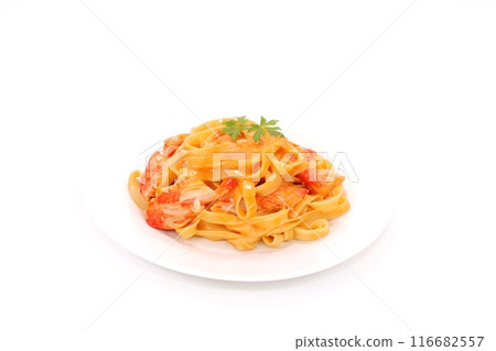 Crab-flavored tomato cream pasta with crab sticks on a light background Crab-flavored tomato cream pasta with crab sticks on a light background 116682557