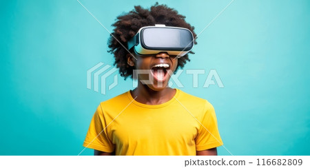 Teenager black boy experiencing virtual reality with joyful expression 116682809