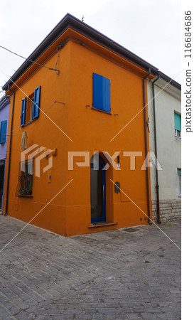 The wall at Borgo San Giuliano typical street with low and colorful houses at Rimini, Italy 116684686