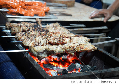 Making of Chicken Tandoori at Zakaria Street During eid 116684915