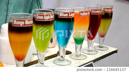 Colourful Juice Served in a Row Colourful Juice Served in a Row 116685137