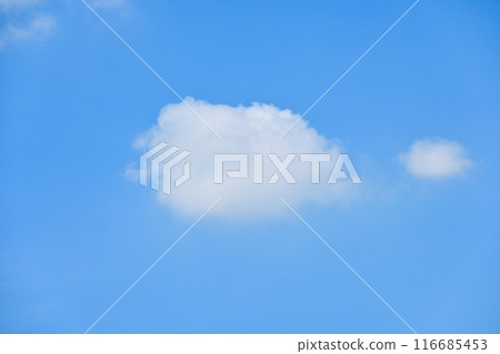 beautiful blue sky and white fluffy single cloud with sunrise in the morning, natural background 116685453