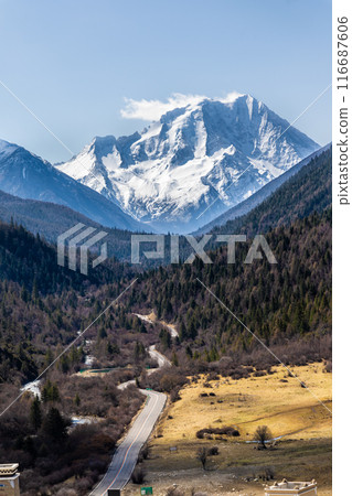 Mount Yala is one of the four holy mountains in the Garze Tibetan Autonomous Prefecture, China. This view is from the North side of Mount Yala from Daofu county. Mount Yala is one of the four holy mountains in the Garze Tibetan Autonomous Prefecture, China. This view is from the North side of Mount Yala from Daofu county. 116687606